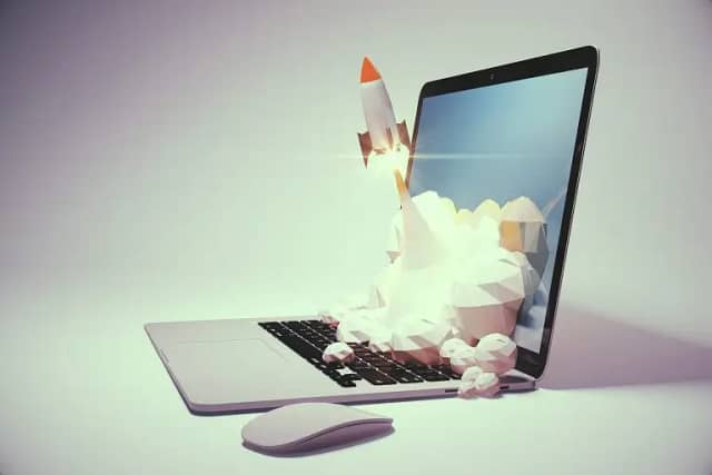 Rocket launching out of a laptop screen